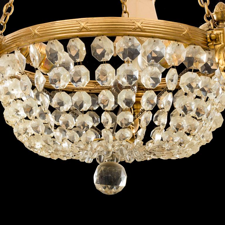 A EMPIRE STYLE CEILING CHANDELIER EARLY 20TH CENTURY.