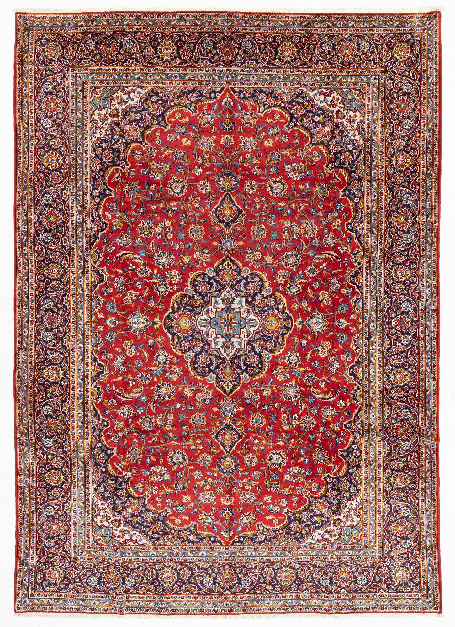 A Keshan carpet, approximately 408 x 287 cm.