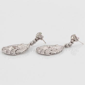 A pair of diamond stud earrings set with old-cut diamonds with a total weight of ca 2.00 cts.