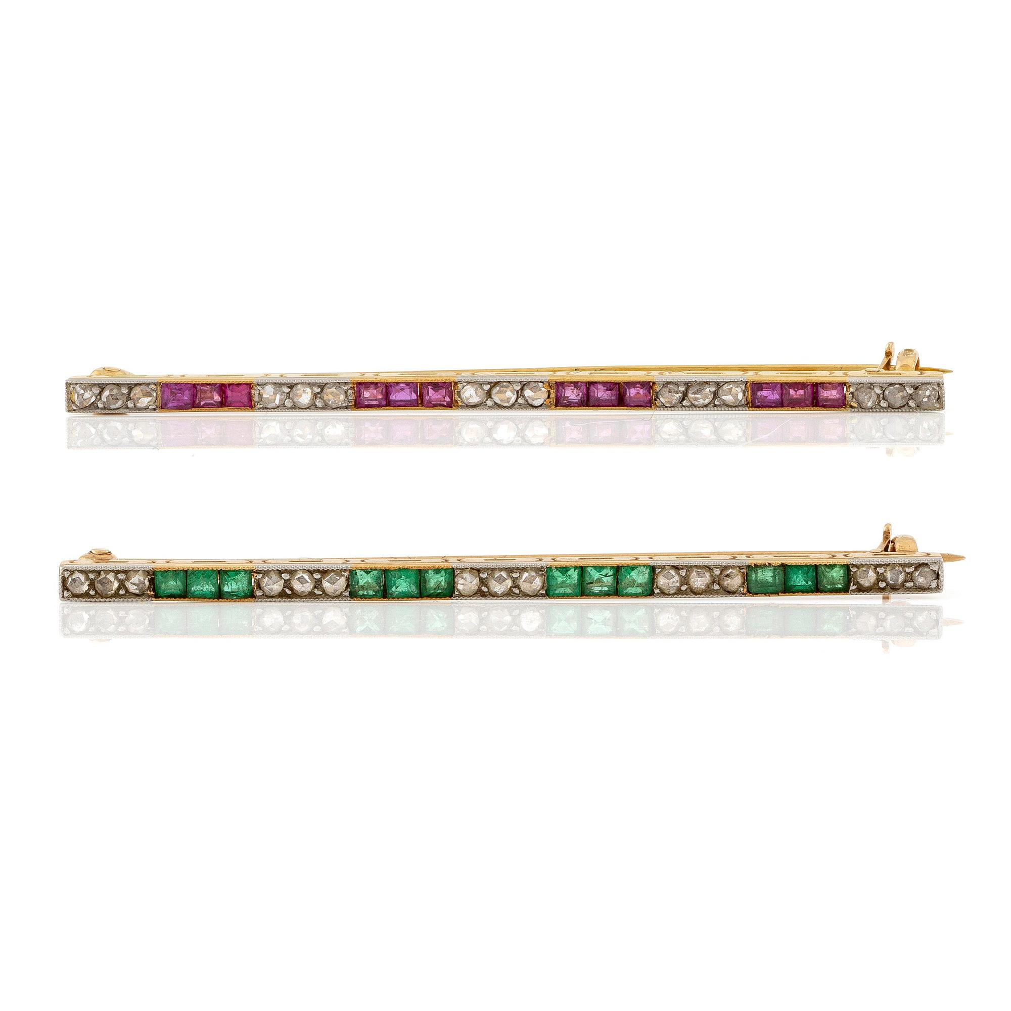 Two brooches in 18K gold and platinum set with step-cut emeralds and rubies and rose-cut diamonds.