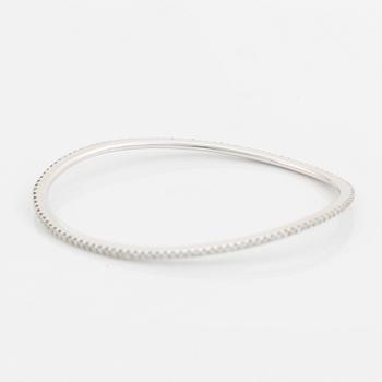 An Ole Lynggaard 18K white gold "Love" bangle set with round brilliant-cut diamonds, design Charlotte Lynggaard.