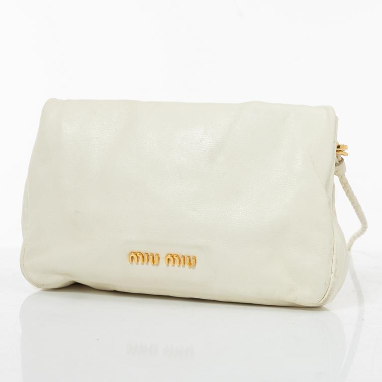 Miu Miu, a handbag/clutch.