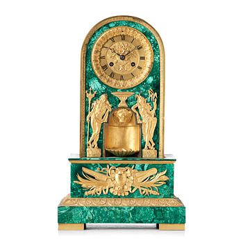 An Empire early 19th century mantel clock.