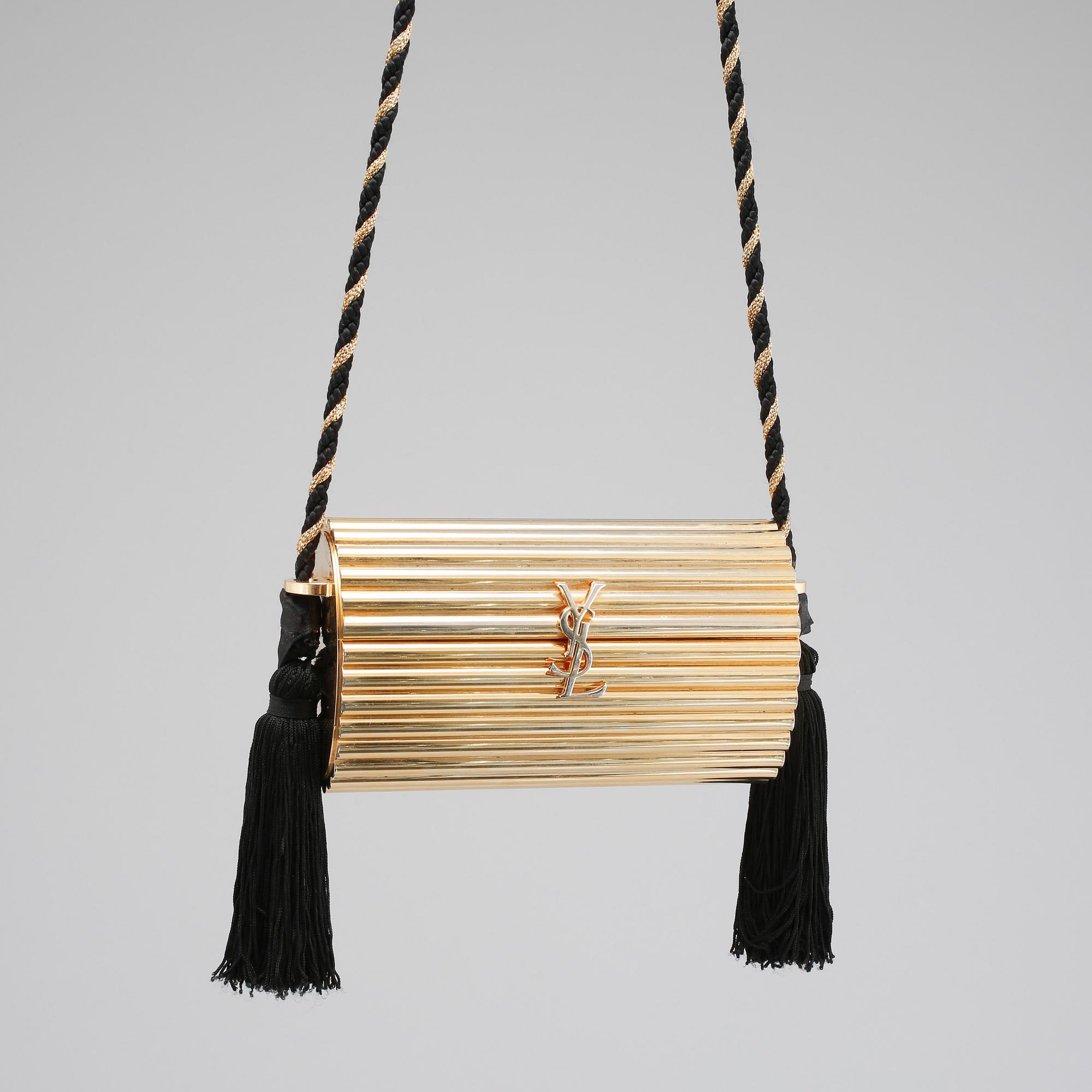 AFTONVÄSKA, "Gold Tassel Clutch", Yves Saint Laurent.