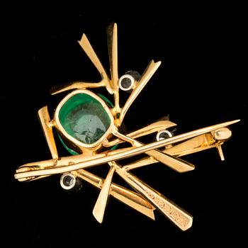 A cabochon-cut emerald and rose-cut diamond brooch. Design by Barbro Littmarck for W.A Bolin.