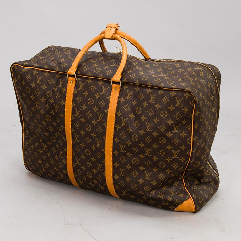 LOUIS VUITTON Monogram Canvas Sirius 65 Suitcase.