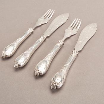 A German 20th century set of 12 fish cutlery low grade silver mark of F W Hespe hamburg early 1900s.