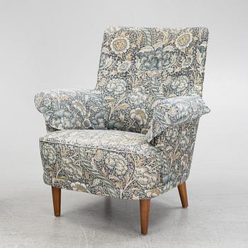 Carl Malmsten, a pair of Hemmakväll easy chairs .