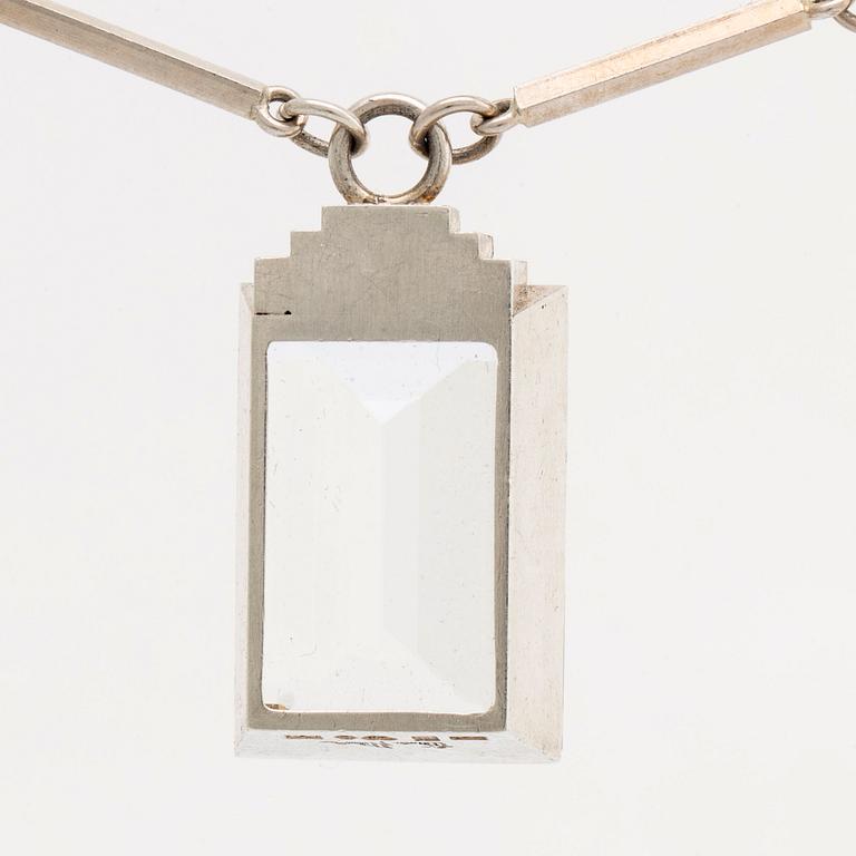 A Wiwen Nilsson sterling and rock crystal pendant and chain, stamped 'New York 39', Lund 1939.