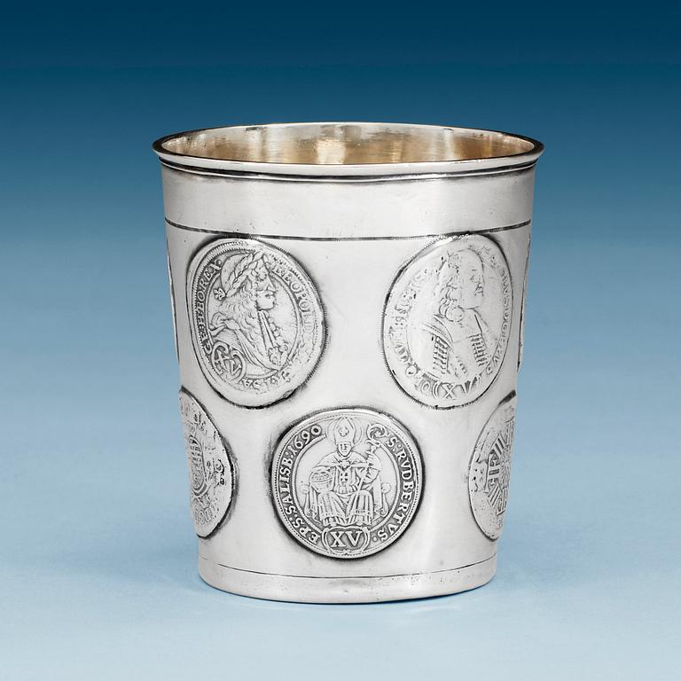 A Austrian-Hungarian early 18th century parcel-gilt beaker, unmarked.
