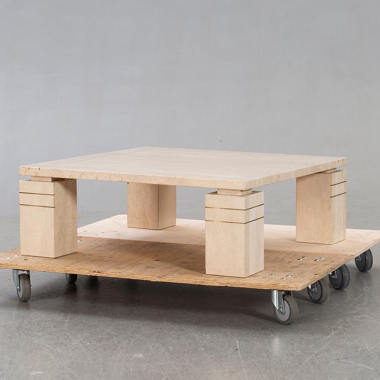 A 1970/80s travertin coffee table.