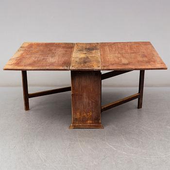 A gate-legged table from the early 19th century.