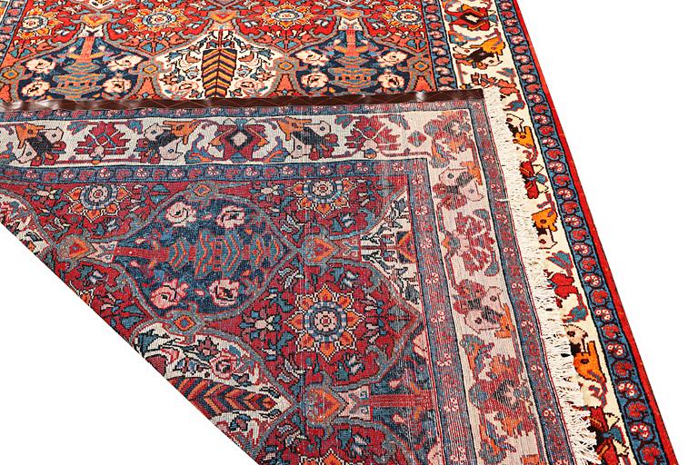 A Hamadan carpet, c. 335 x 184 cm.