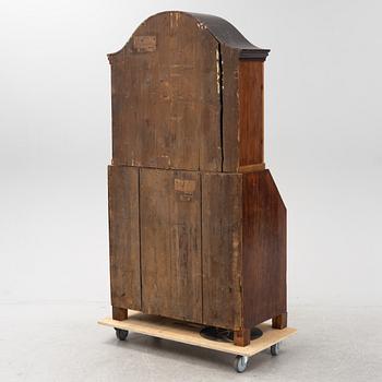 A mahogany-veneered Empire cabinet, first part of the 19th Century.