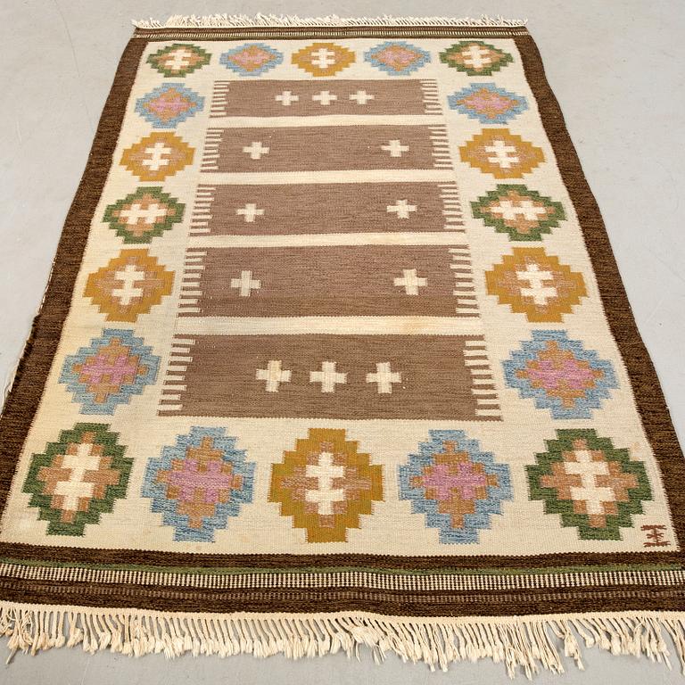 Matta rölakan signerad ca 230x165 cm.