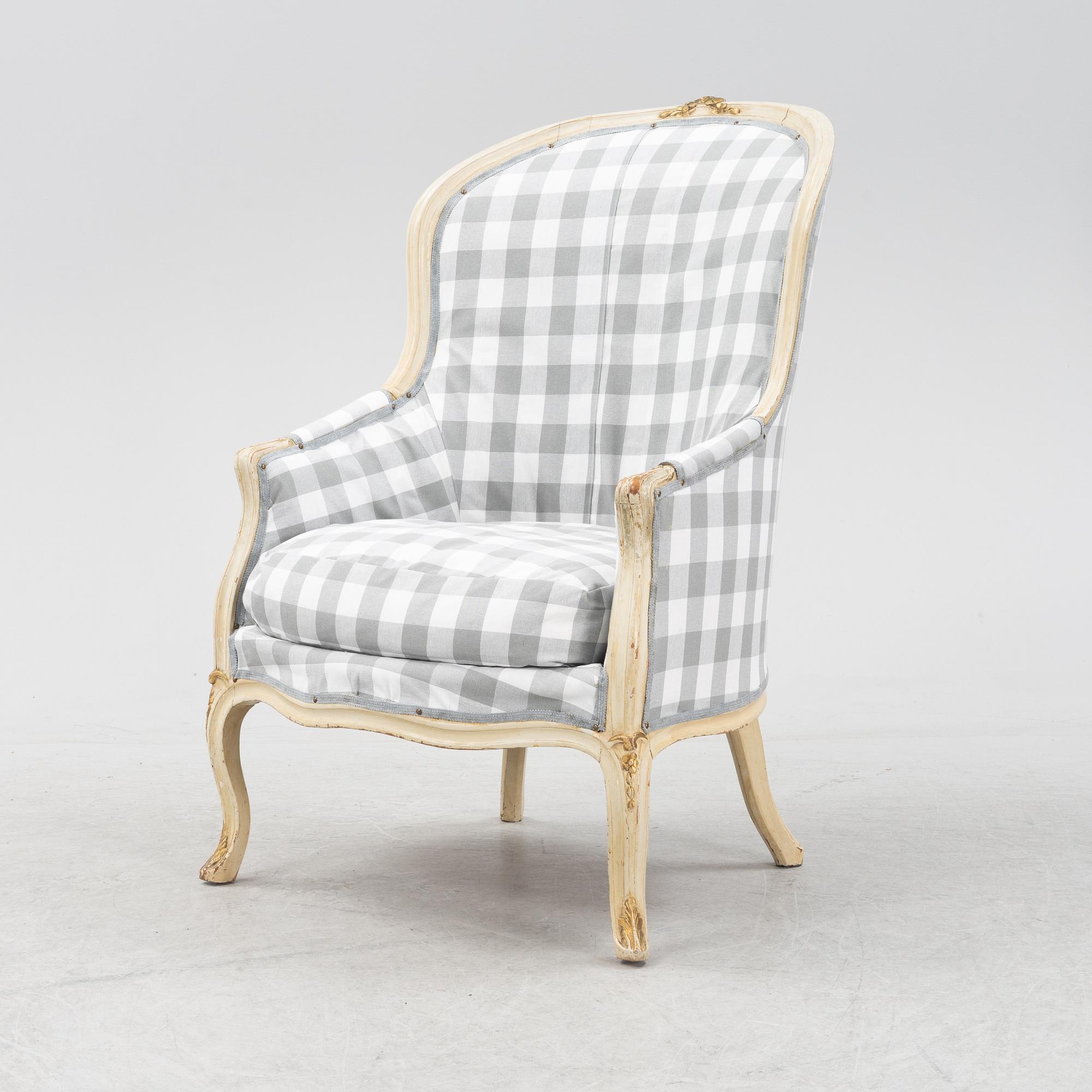 A Rococo-Style Bergère Easy Chair, first half of the 20th century.