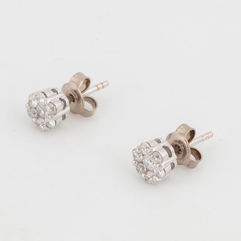 Brilliant-cut diamond earrings.