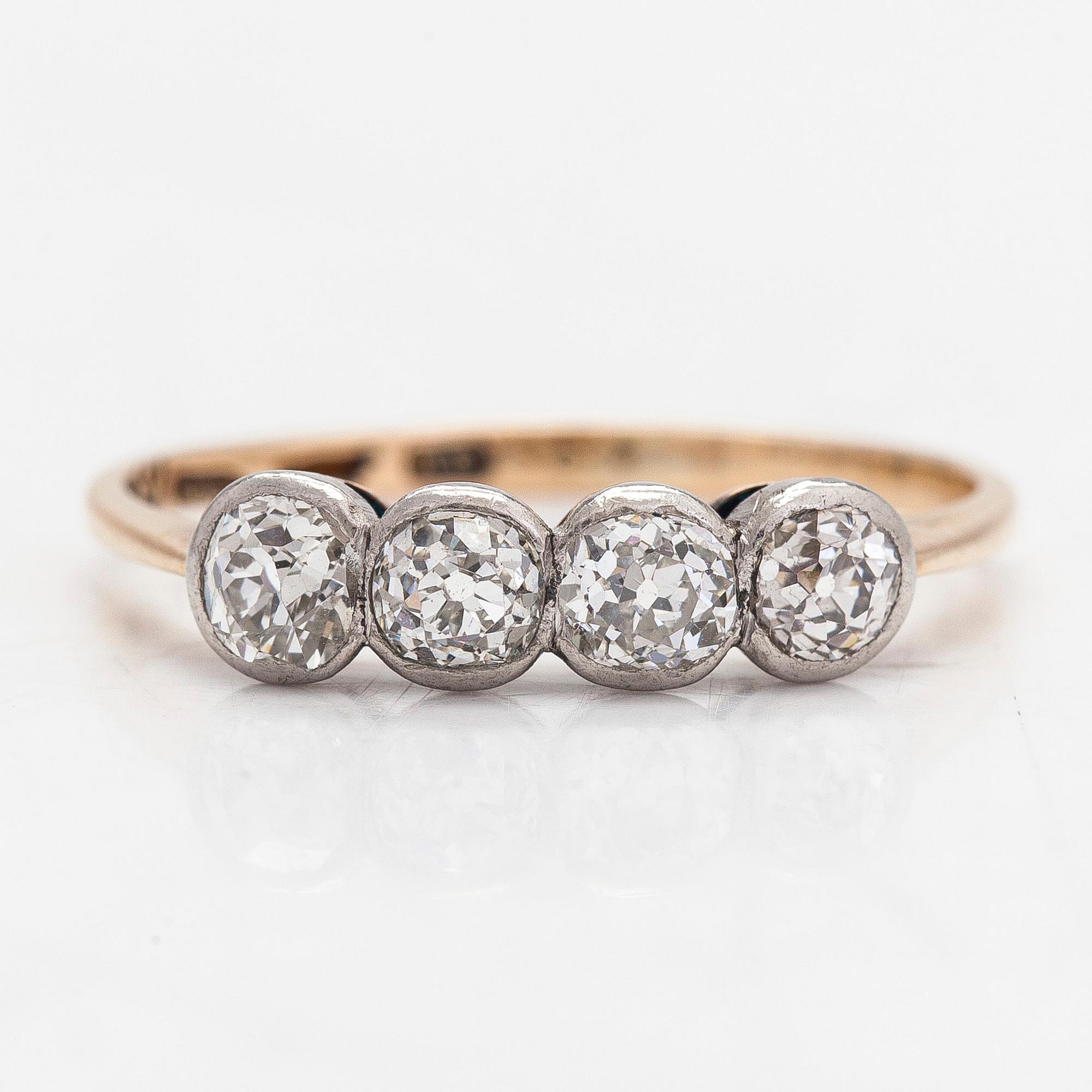 A 14K gold ring, with old-cut diamonds totalling approximately 0.32 ct, A.Koistinen, Helsinki 1939.