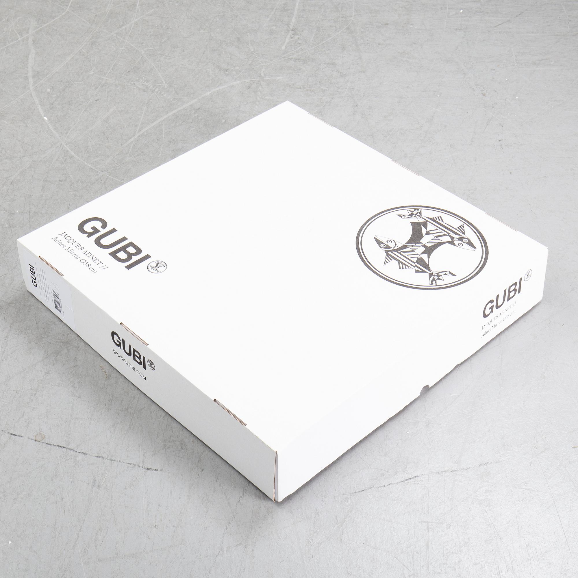 A mirror "Adnet" with leather hanging in original box, designed 1950 by Jacques Adnet for Gubi, Denmark.