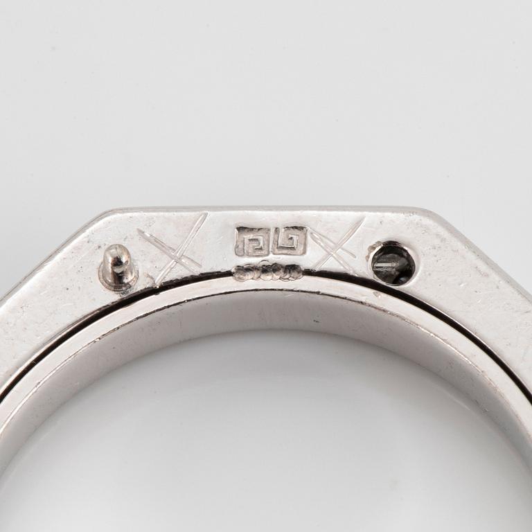 Five Paul Binder rings in 18K white gold set with baguette- and round brilliant-cut diamonds.