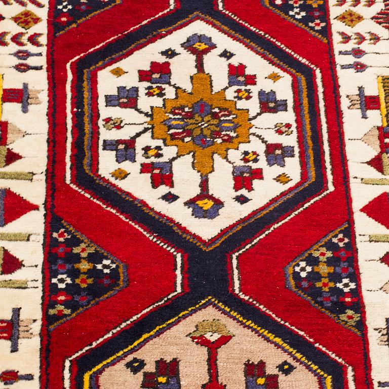 An oriental runner  possilby Anatolia, around 397 x 70 cm.