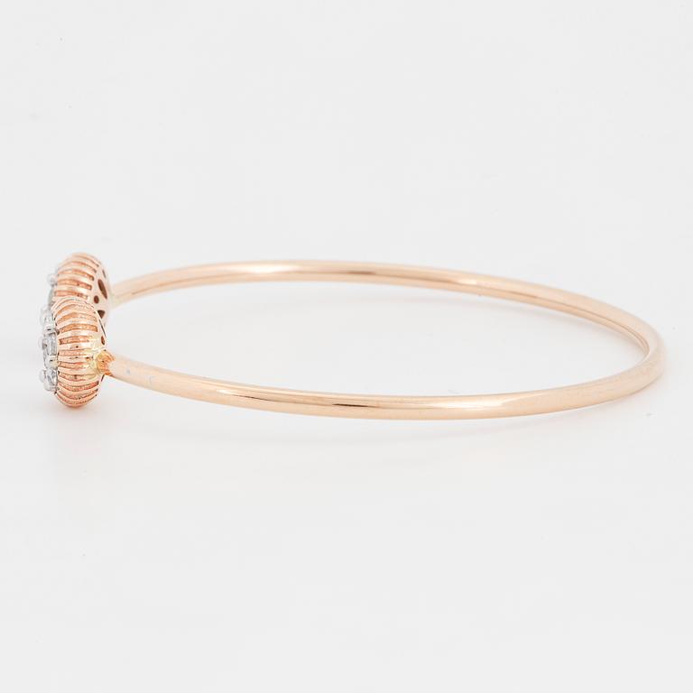 An 18K rose gold bracelet set with round brilliant-cut diamonds.