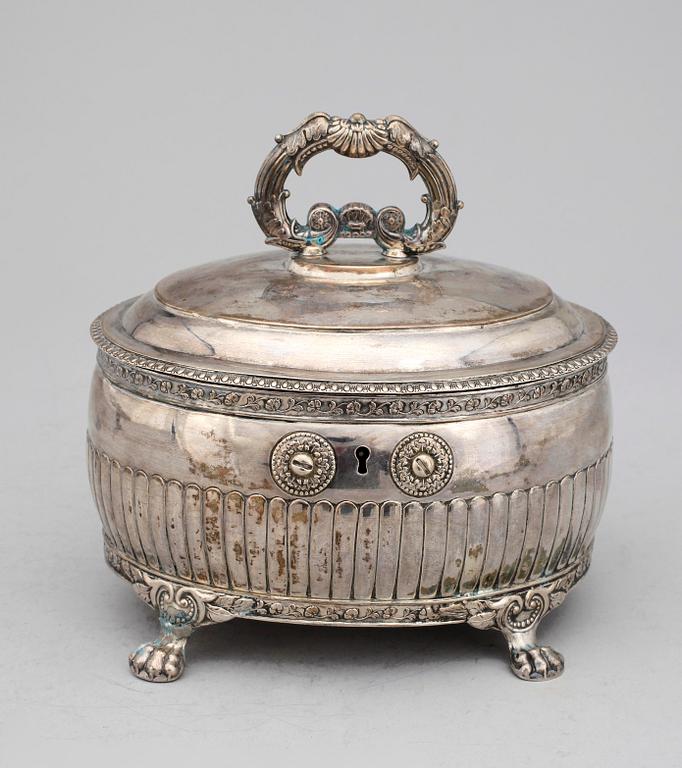 SOCKERSKRIN, silver, empir. Otto Wilhelm Kjellberg, Västerås, 1837. Vikt ca 681 g.