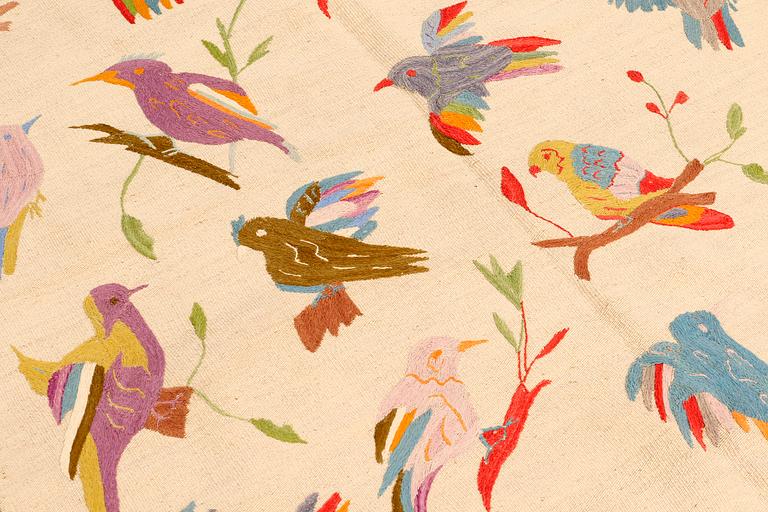 An embroided flat weave, ca 199 x 144 cm.