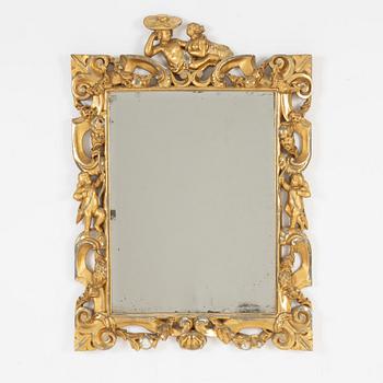 A gilt Baroque style mirror, circa 1900.