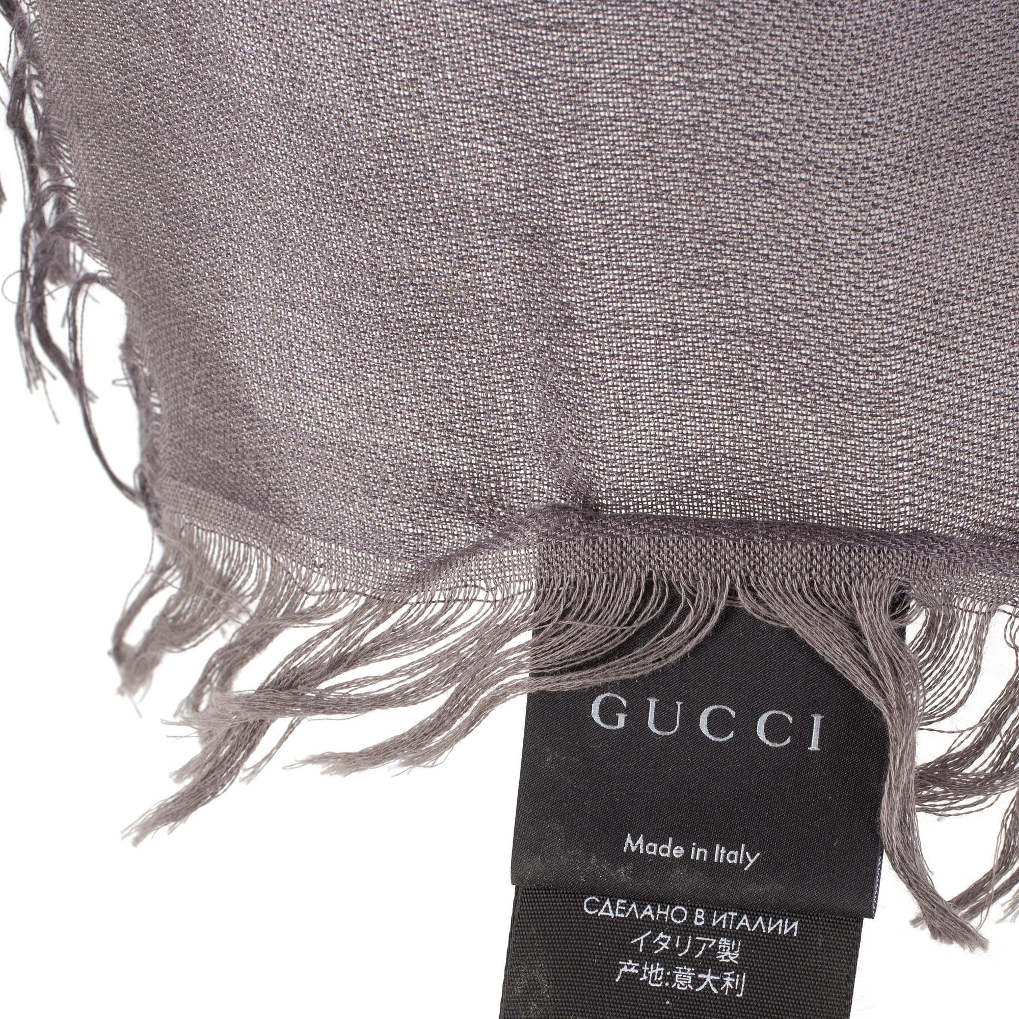 A shawl by Gucci.