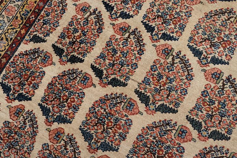 A Bakhtiari carpet, signed, c. 580 x 212 cm.