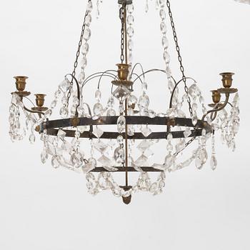 A Gustavian style chandelier, around the year 1900 incorporating older elements.