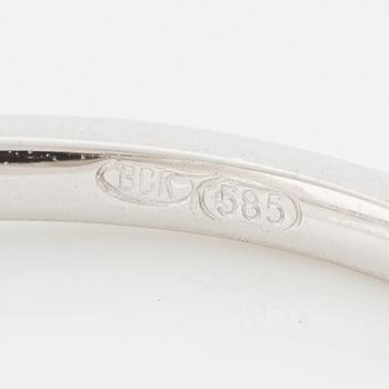 Ring 14K vitguld med orange safir och briljantslipade diamanter.