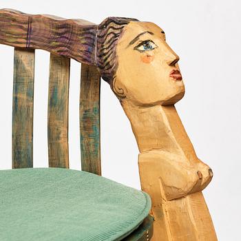 Gérard Rigot, a sculptured and signed armchair, late 20th century.