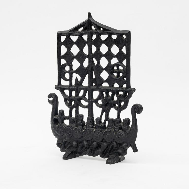 Olle Hermansson, gnistskydd signerad Husqvarna, 1960-tal gjutjärn.