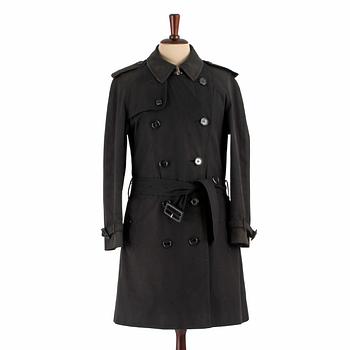 586. BURBERRY, a black cotton trenchcoat.