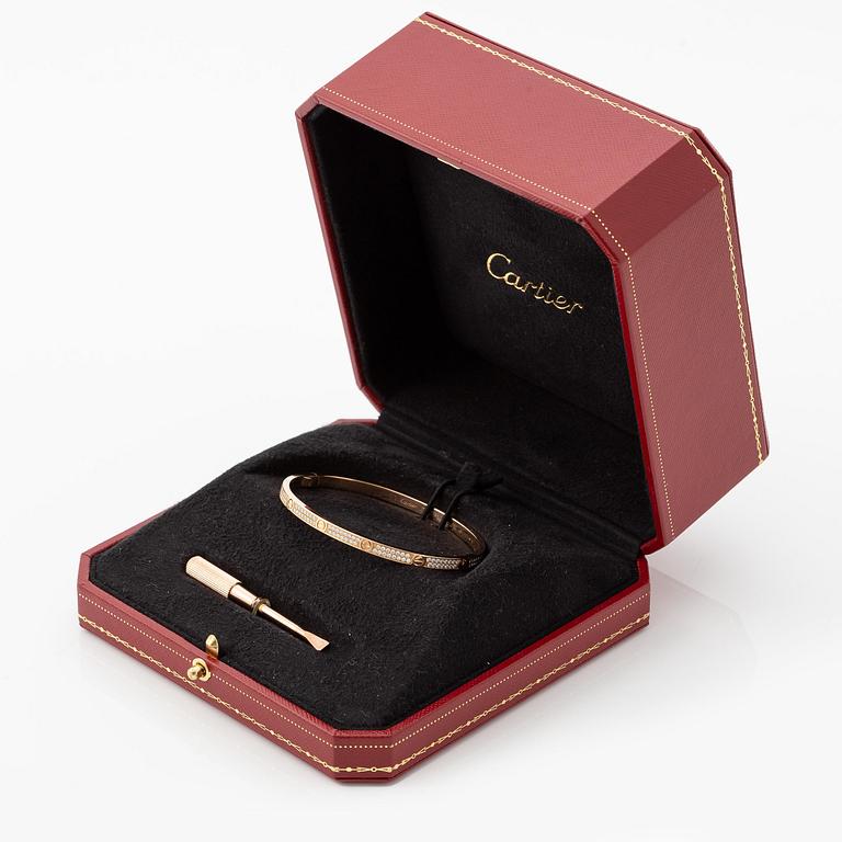 A Cartier bangle "Love" 18K rose gold with round brilliant-cut diamonds.