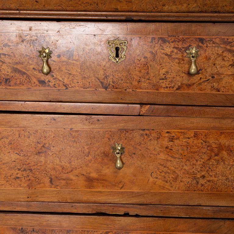 A Swedish root veneered late baroque chest of drawers, first half of the 18th century.