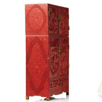 A carved  lacquer 'Kang'Cabinet, Qing dynasty, 18/19th Century.