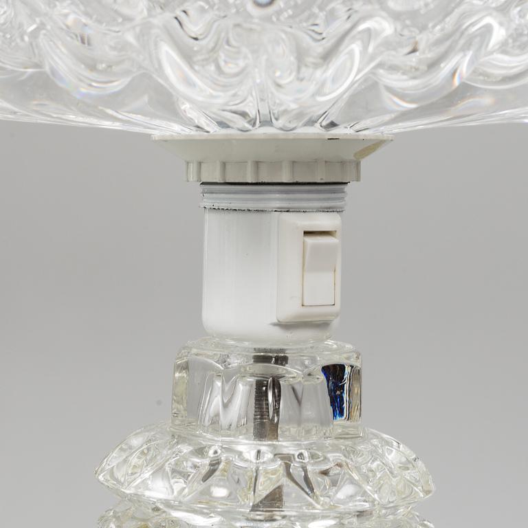 A glass floor lamp.