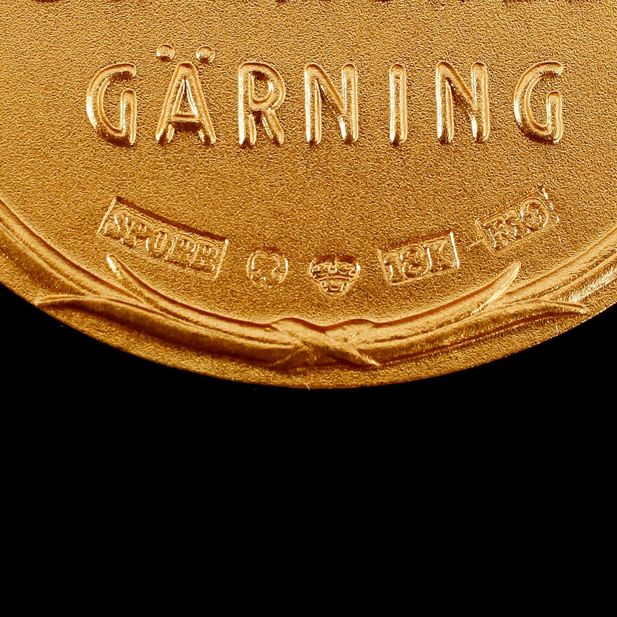 MEDALJ, 18 k guld, Sporrong, 1980. Vikt ca 27 gram.
