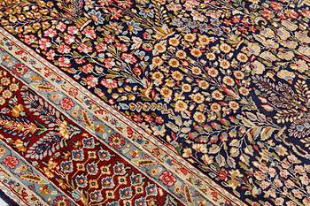 A 'Millefleur' Kerman carpet, c. 393 x 266 cm.