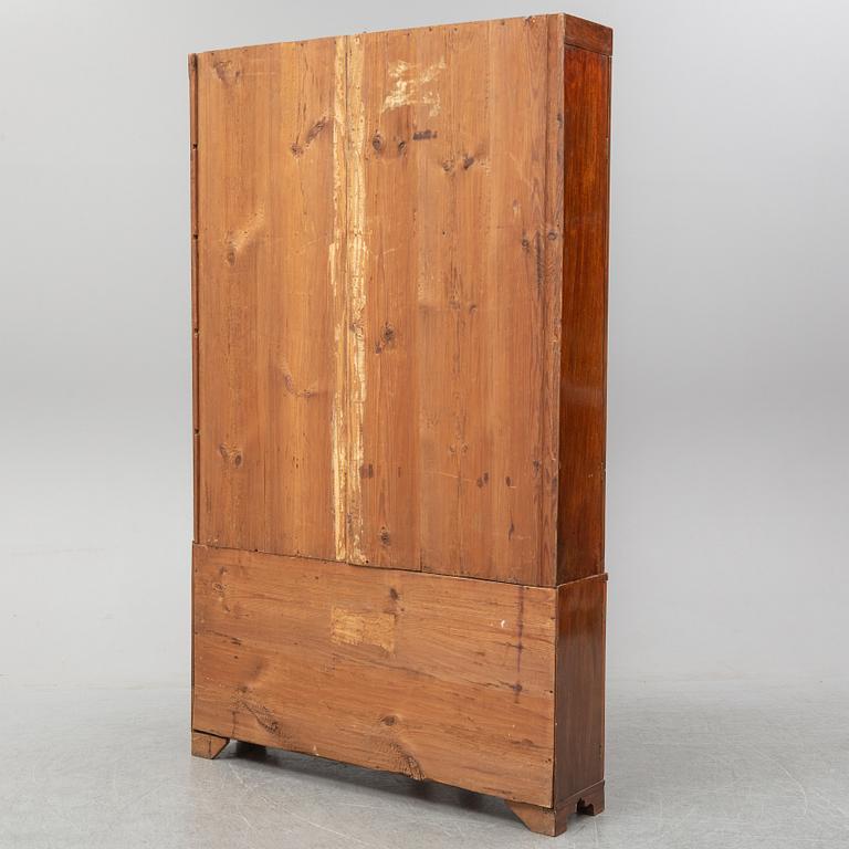 A second half of the 19th century mahogany veneered display cabinet.