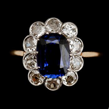 RING, 18 k guld, 10 briljanter totalt 0.90 ct samt syntetisk safir.