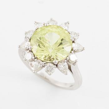 Ring, in the form of a flower, platinum with chrysoberyl and drop-cut and brilliant-cut diamonds.