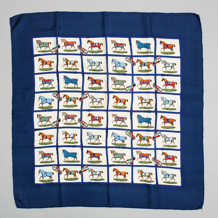 Hermès, a 'Petits Chevaux' silk scarf.