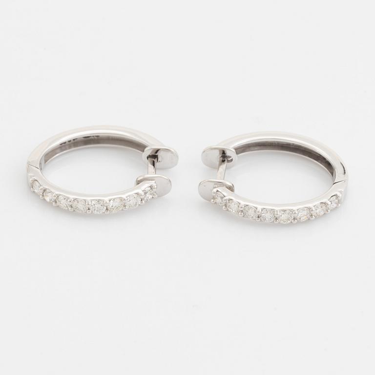 Brilliant cut diamond hoop earrings.
