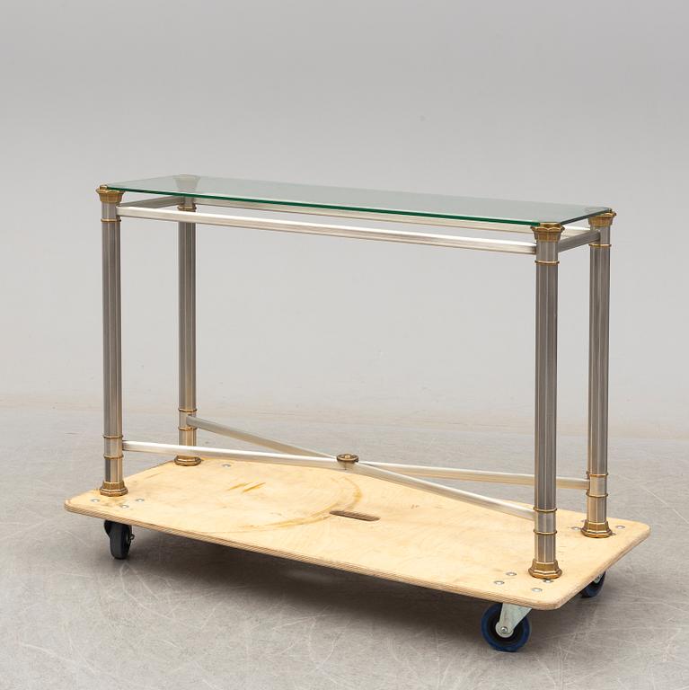 A steel and brass side table, late 20th Century.