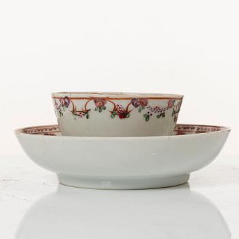 A set of five famille rose tea cups, Qing dynasty, 18th century and a bowl, Qing dynasty, 19th century.