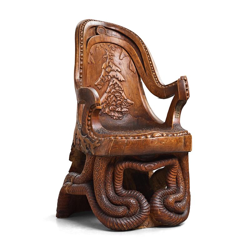 Knut Fjaestad, an Art Nouveau sculptured and carved pine throne, Sweden early 20th century.